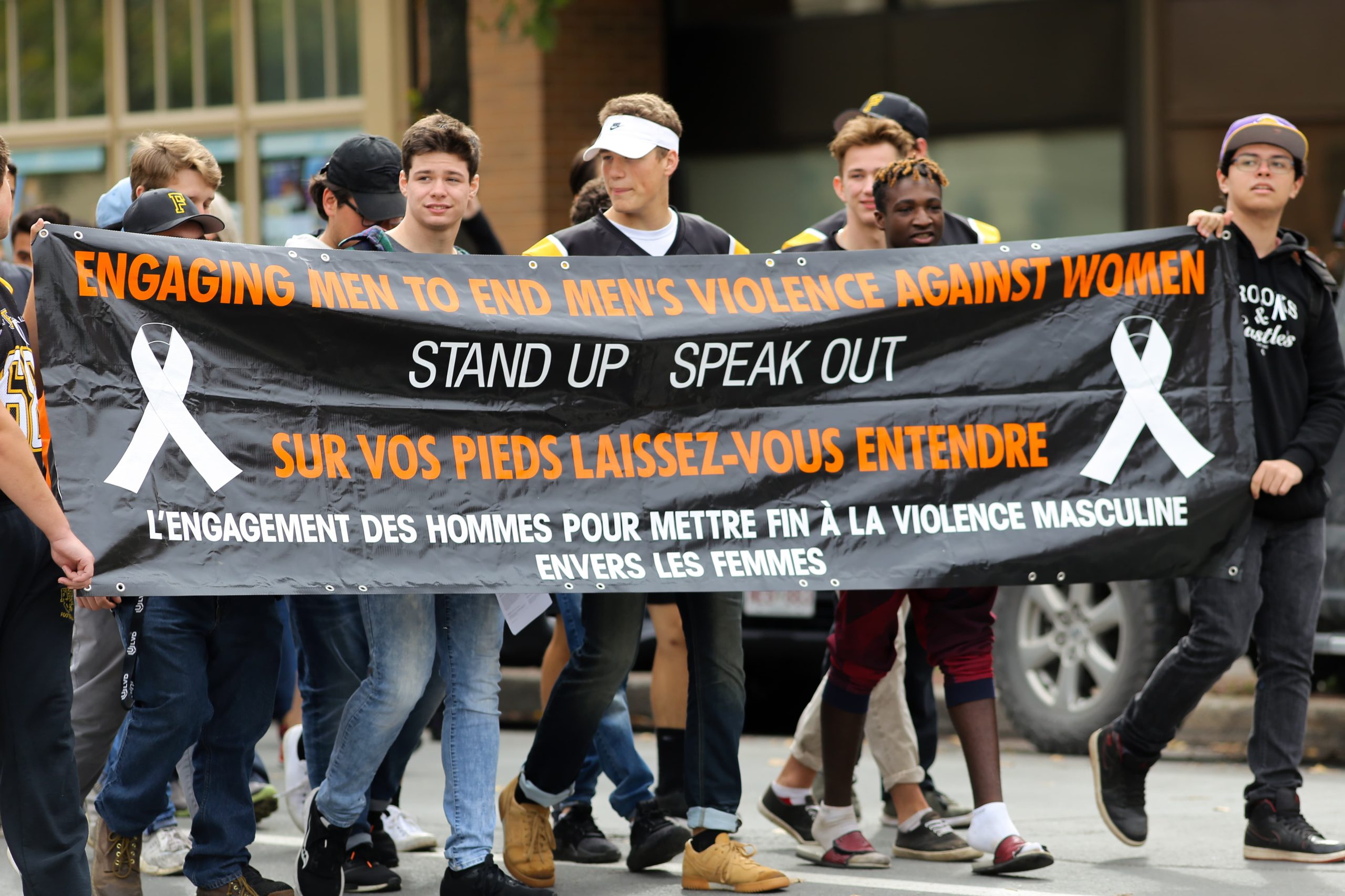 Community members gather to protest men’s violence against women