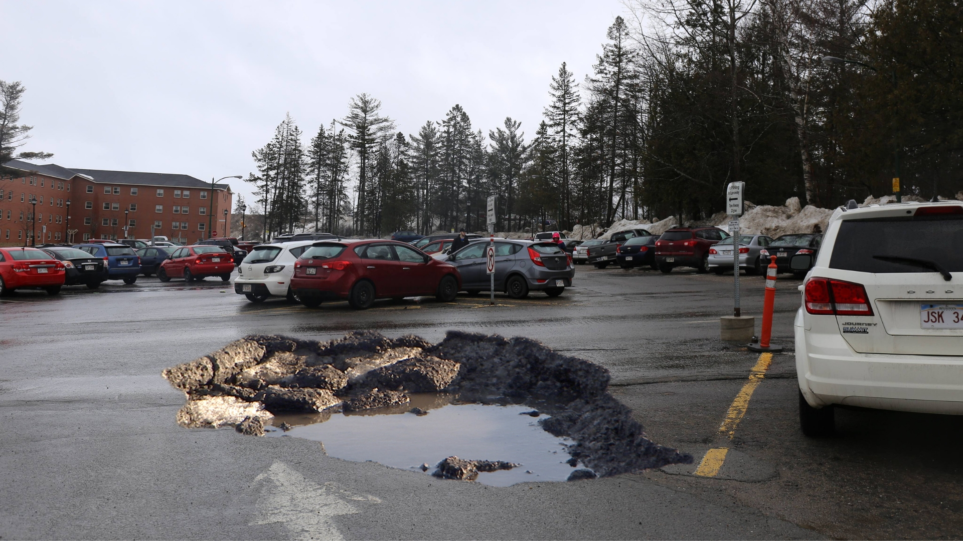 Satire: Giant sinkhole shuts down SUB parking lot