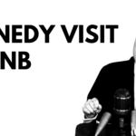 black text on white background "KENNEDY VISIT TO UNB" with image of John F Kennedy to the right of the text