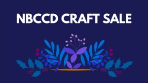 white text on navy background "NBCCD CRAFT SALE" below text is a blue and purple floral arrangement