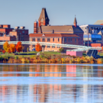 image of downtown Fredericton as seen from the Wolastoq River