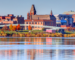 image of downtown Fredericton as seen from the Wolastoq River